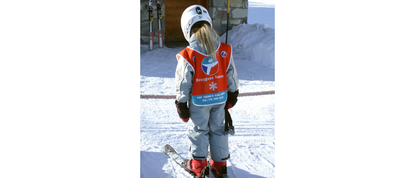 Fabricante de petos de esquí personalizados abiertos con goma elástica lateral para Tignes