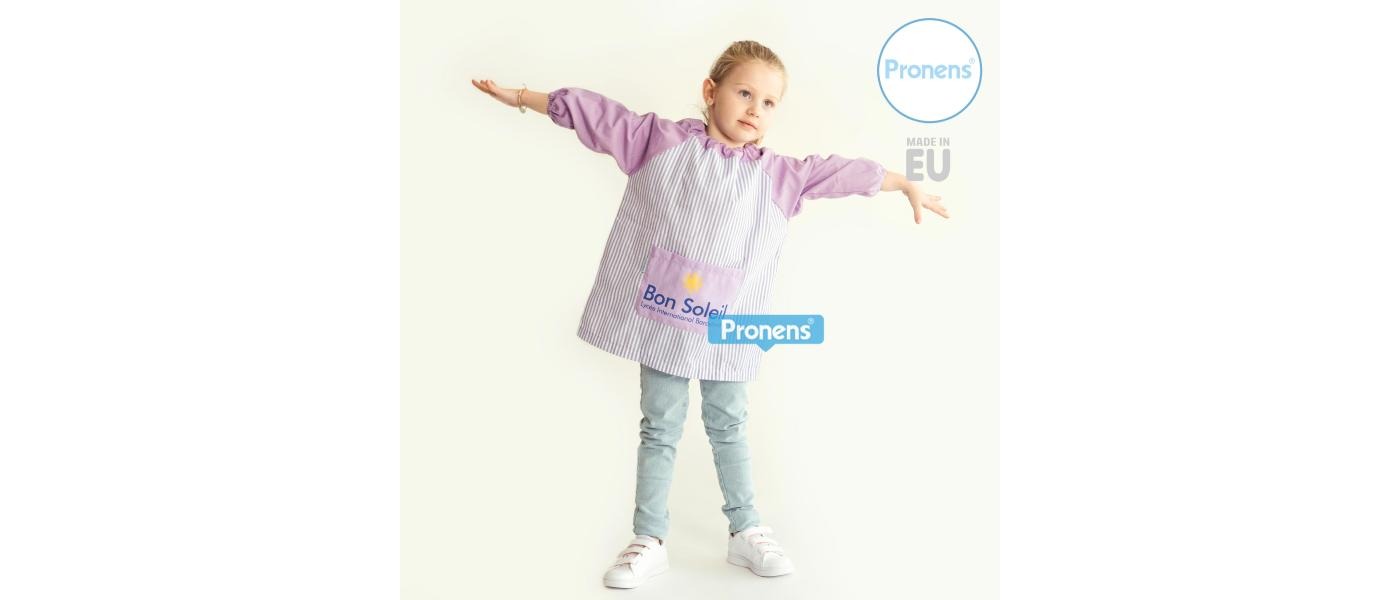 Manufacturer of custom school smocks without buttons for schools, front model
